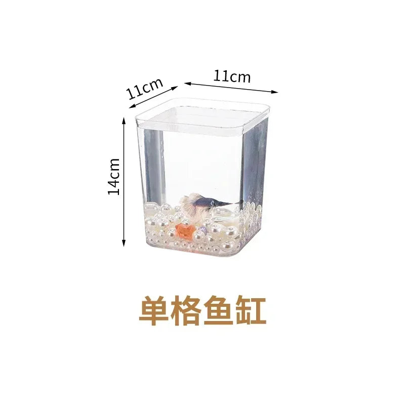 A small barrel-shaped fish tank with a built-in lighting system, a tabletop miniature landscape, and a mini aquarium s